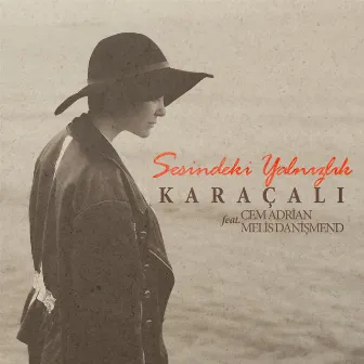 Sesindeki Yalnızlık (feat. Cem Adrian & Melis Danişmend) by Karaçalı