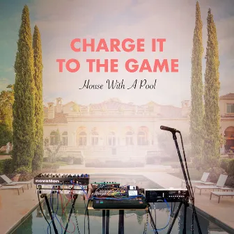 House with a Pool by Charge It to the Game