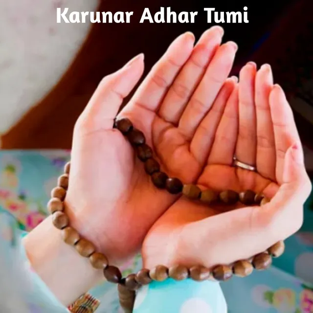 Karunar Adhar Tumi