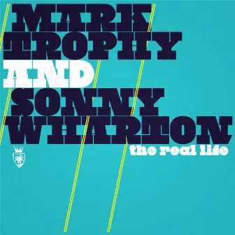 The Real Life by Mark Trophy