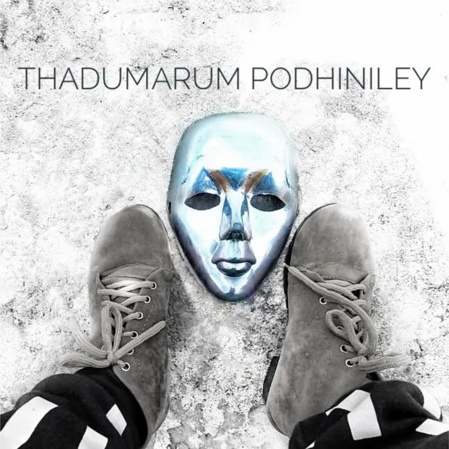 Thadumarum Podhiniley