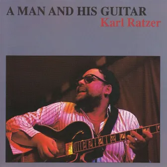 A Man and His Guitar by Karl Ratzer