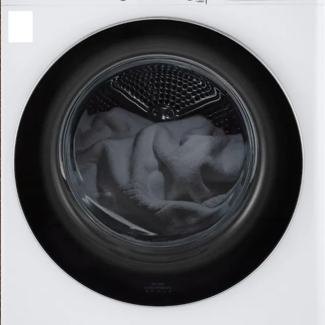 Clothes Dryer Containing Clothes with Metal Buttons