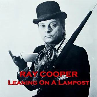 Leaning on a Lampost by Ray Cooper