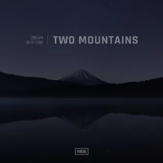 Two Mountains by Deep Fog