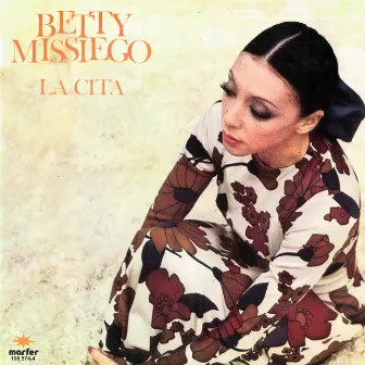 La Cita by Betty Missiego