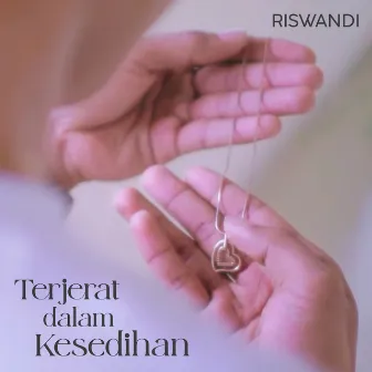 Terjerat Dalam Kesedihan by Riswandi