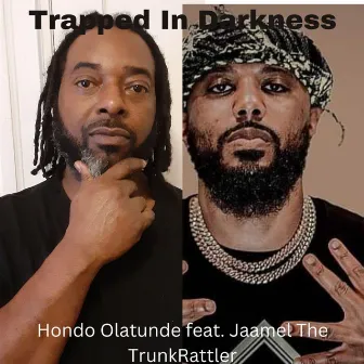 Trapped In Darkness by Hondo Olatunde