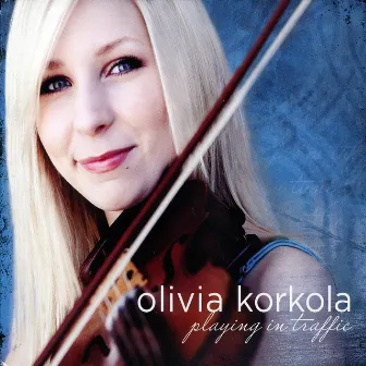 Playing in Traffic by Olivia Korkola