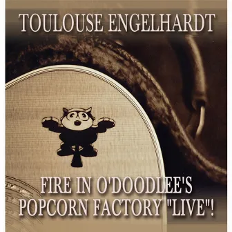 Fire in O'Doodlee's Popcorn Factory (Live) by Toulouse Engelhardt