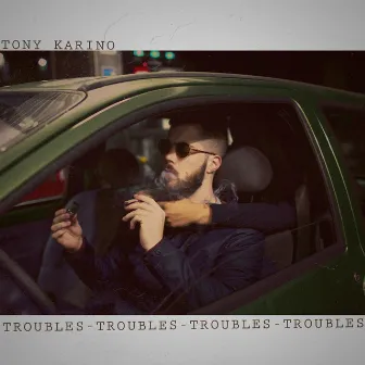 Troubles by Tony Karino