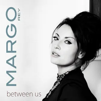 Between Us by Margo Rey