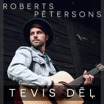 Tevis Dēļ by Roberts Pētersons