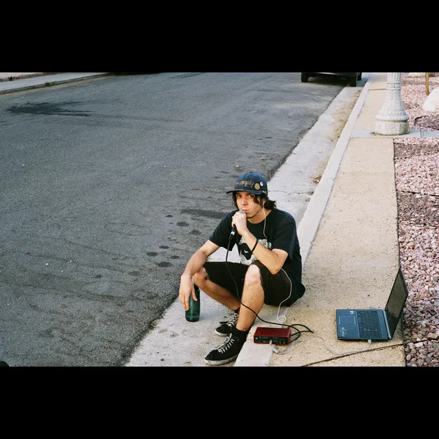 Sitting on a Curb