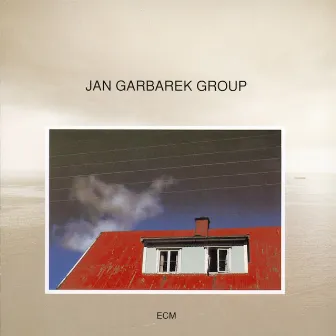 Photo With Blue Sky, White Cloud, Wires, Windows And A Red R by Jan Garbarek Group