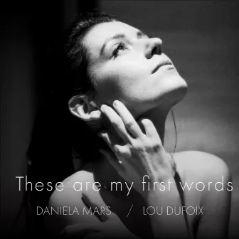 These Are My First Words - for contrabass flute, alto flute and strings by Lou Dufoix