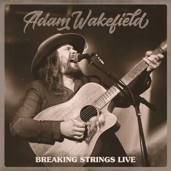 Breaking Strings Live by Adam Wakefield