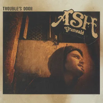 Trouble's Door by Ash Grunwald