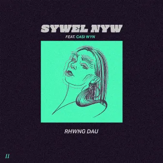 Rhwng Dau by Sywel Nyw