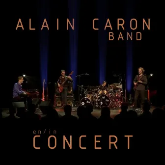 En / In Concert by Alain Caron