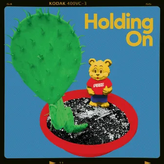 Holding On by PJ Sykes