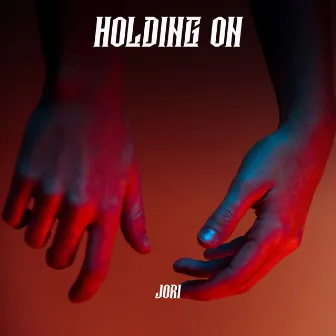 Holding on by Jori