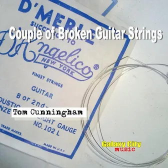 Couple of Broken Guitar Strings by Tom Cunningham