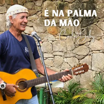 É Na Palma da Mão by Carlos Buby