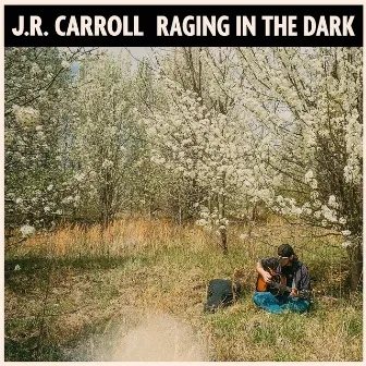 Raging in the Dark by J.R. Carroll