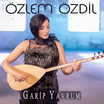 Garip Yavrum by Özlem Özdil