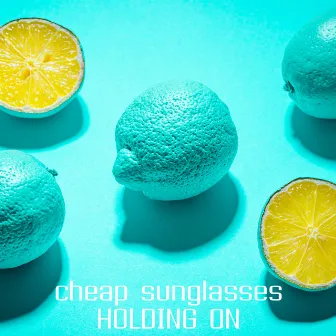 Holding On by Cheap Sunglasses