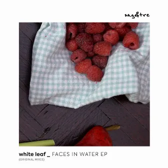 Faces in Water by White Leaf