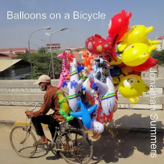 Balloons on a Bicycle by Jonathan Summers