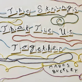 The Strings That Tie Us Together by Madds Buckley