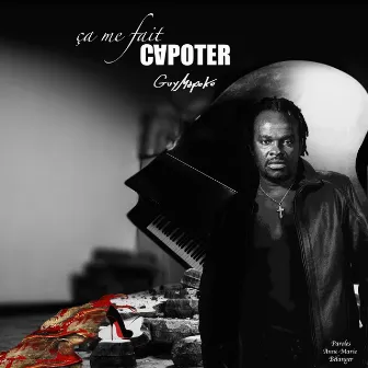 Ça me fait capoter by Guy Mapoko