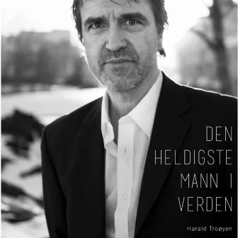 Den Heldigste Mann I Verden by Harald Troøyen