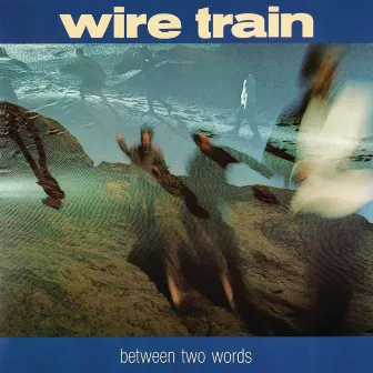 Between Two Words by Wire Train