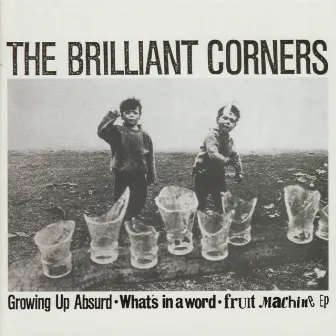 Growing Up Absurd - What's in a Word - Fruit Machine EP by The Brilliant Corners