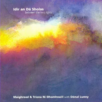 Idir an Dá Sholas by Triona Ní Dhomhnaill