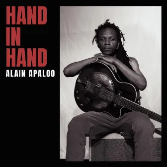 Hand in Hand by Alain Apaloo