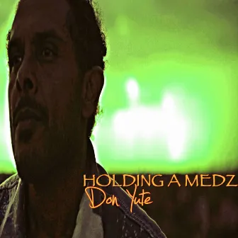 Holding a Medz by Don Yute