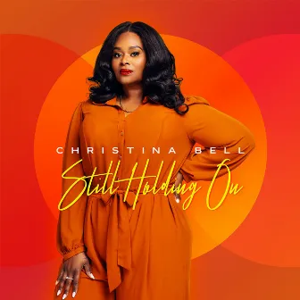 Still Holding On by Christina Bell