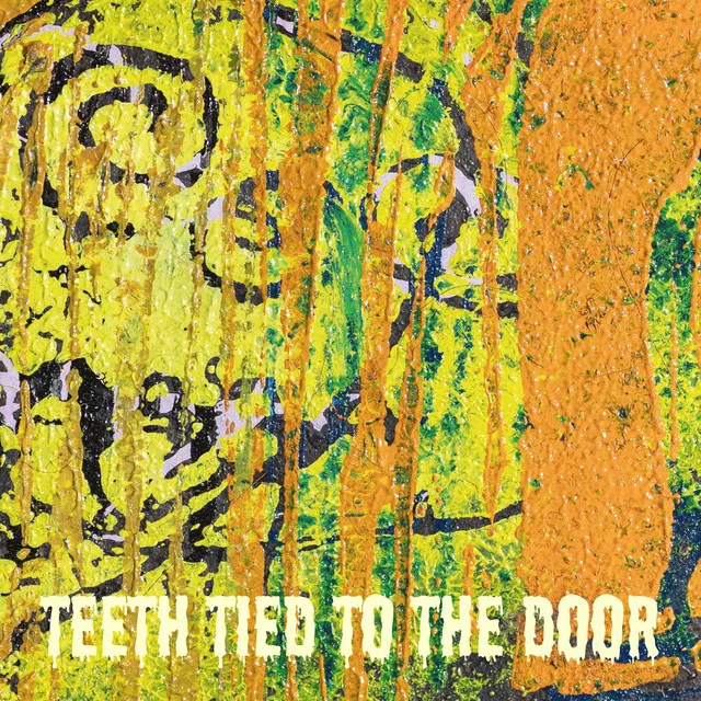 Teeth Tied to the Door