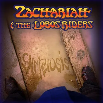 Symbiosis by Zachariah & the Lobos Riders