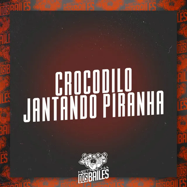 Crocodilo Jantando Piranha