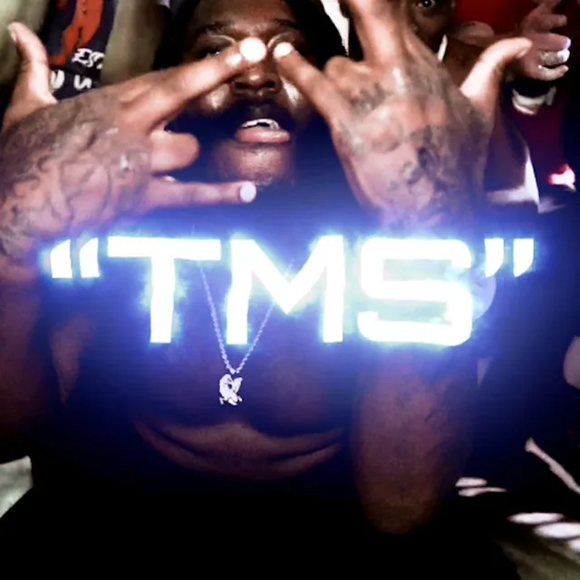 T.M.S.