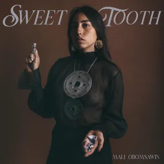 Sweet Tooth by Mali Obomsawin