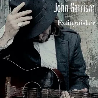 Extinguisher by John Garrison