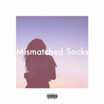 Mismatched Socks by Iko Tabb