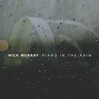 Piano in the Rain by Nick Murray